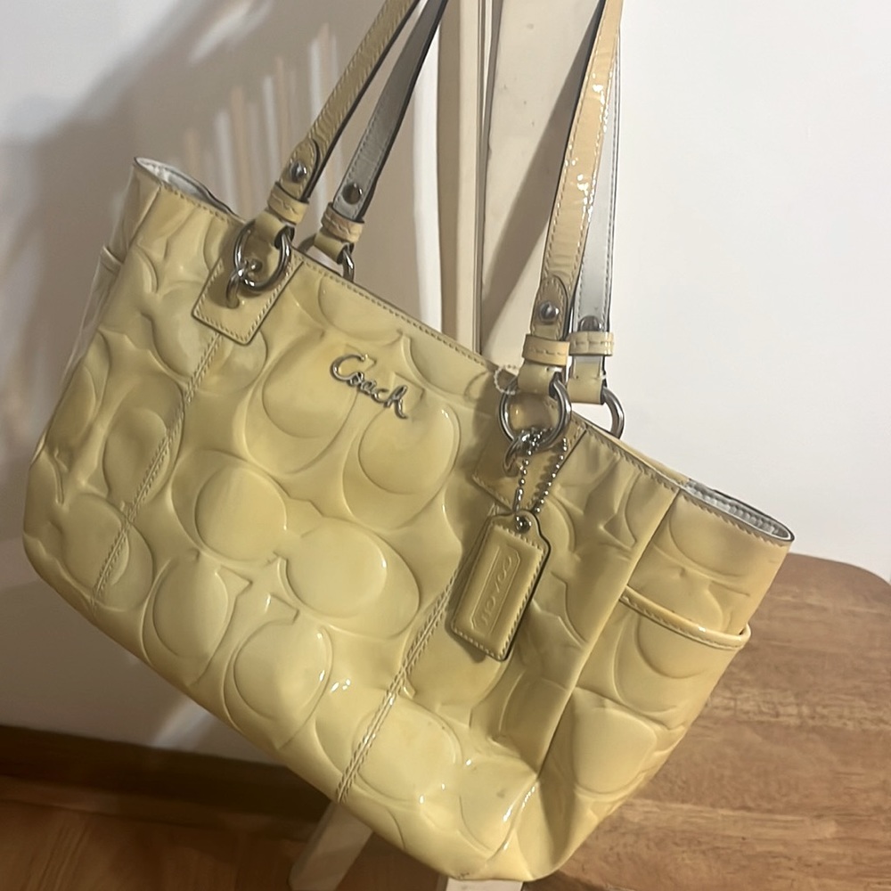 Coach -Adorable Sunshine yellow bag with grey interior.